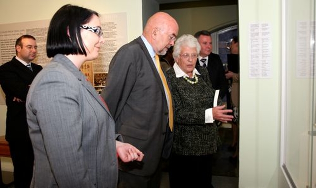 Dr Susan Parkes of the CICE Plunket Museaum committee shows Minister for Education and Skills, Ruairi Quinn around the Kildare Place Society & Schooling in the Nineteenth Century exhibition in the National Museum of Ireland Collins Barracks.