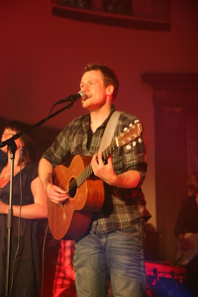 Chris Llewellyn of the Rend Collective on stage at 3 Rock's Reach Beyond Diocesan youth service in St Ann's in Dawson Street, Dublin.