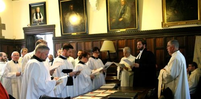 The candidates for ordination to the Diaconate make their declarations surrounded by their colleagues in the Chapter Room of Christ Church Cathedral. 