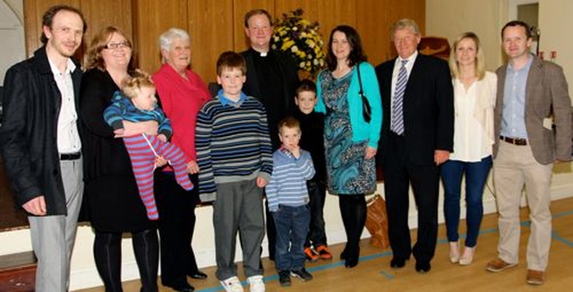 The Revd Bruce Hayes (centre) with his, wife Samantha, children, parents and family following his Service of Institution as the new rector of Dalkey.