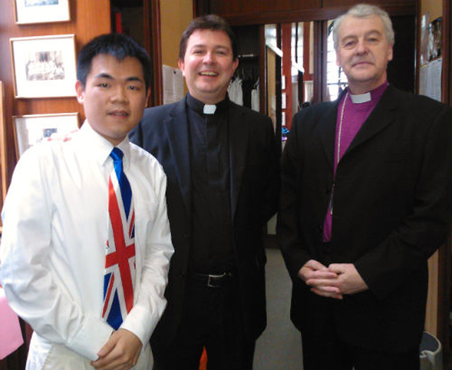 Archbishop Michael Jackson and Revd Dr Alan McCormack are pictured with Alphege Geoffrey of the Hong Kong youth groups. Alphege’s tie playfully recalls the colonial history of the territory. 