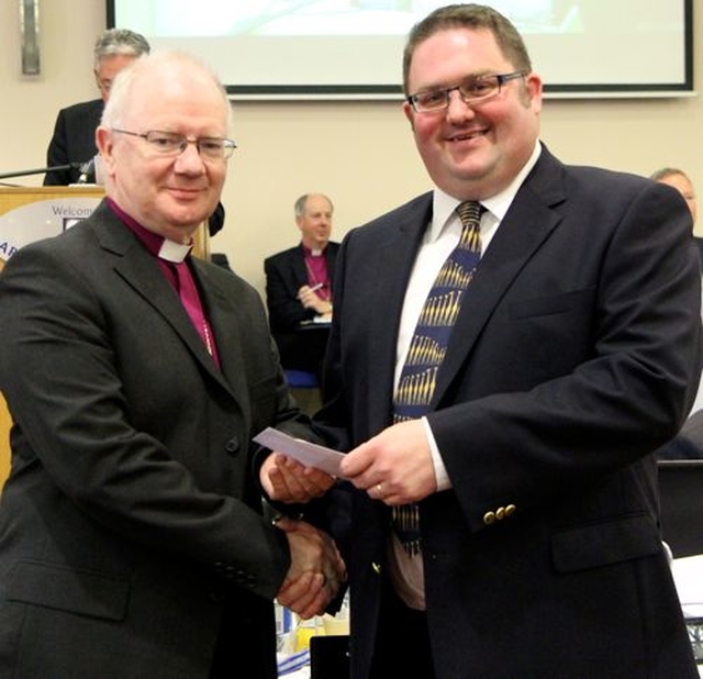 St Patrick’s Cathedral, Dublin, scooped the top prize in two categories of the Church of Ireland Communications Competition when the results were announced at General Synod in Armagh. The cathedral took first place in the ‘Other’ affiliated organisations website category and in the social media category. Pictured is Louis Parminter accepting the award from the Archbishop of Armagh, the Most Revd Dr Richard Clarke. 