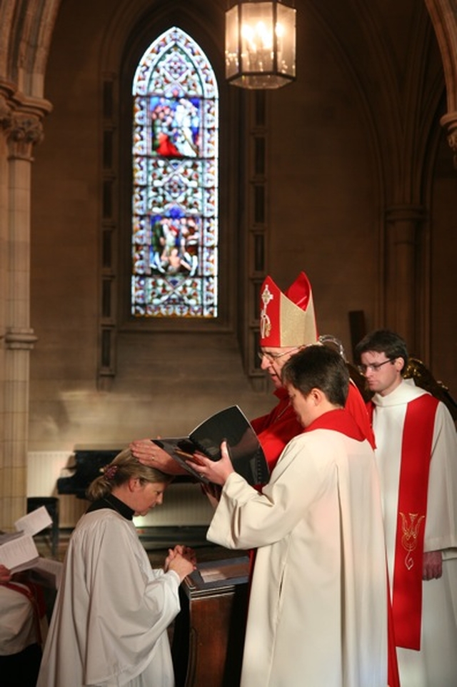 The Archbishop of Dublin and Bishop of Glendalough, the Most Revd Dr John Neill laying hands on the Revd Terry Alcock at her ordination to the Diaconate in Christ Church Cathedral.