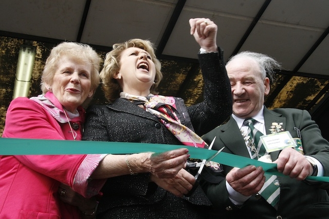 President Mary McAleese cuts the ribbon as she officially opens the 2010 National Ploughing Championships in Athy, Co Kildare.
