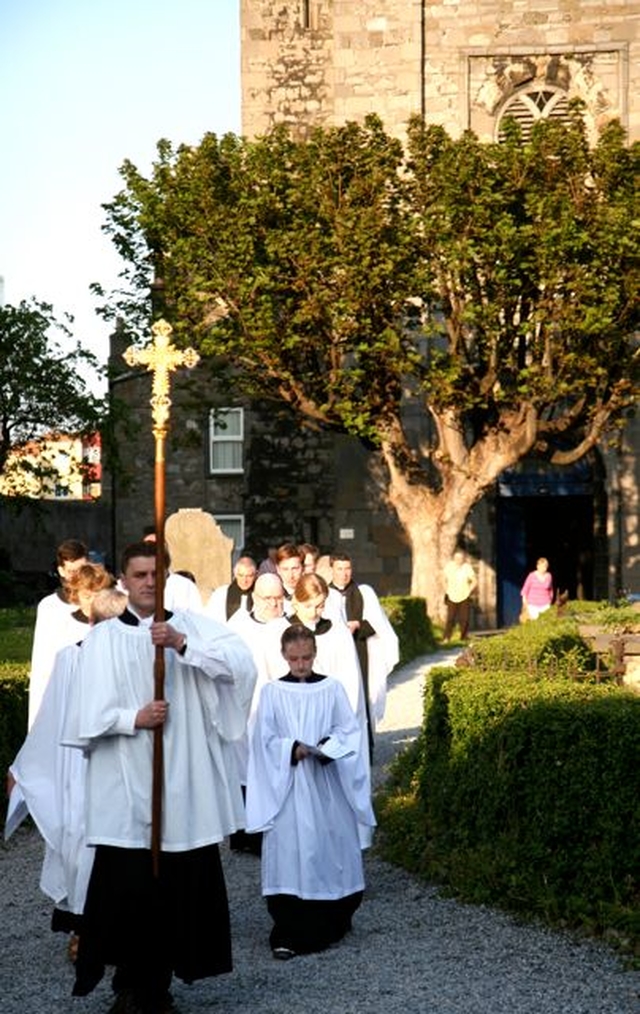 The choir of St Michan’s Church process out of the church to the blessing of the new Smithfield entrance. 