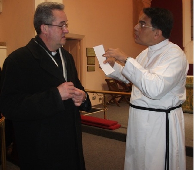 The Very Revd Dermot Dunne, Dean of Christ Church Cathedral, and the Revd Dr Jacob Thomas, Belfast Bible College, chat after the Inaugural Eucharist Service of the Church of South India Malayalam in St. Catherine’s Church, St Patrick's Cathedral Group of Parishes.