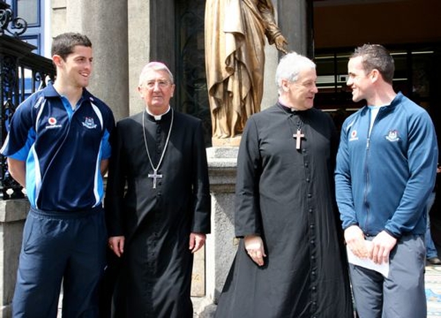 Archbishop Diarmuid Martin and Archbishop Michael Jackson with Dublin Senior Footballers, Rory Carroll and Ger Brennan outside Our Lady of Mount Carmel Church on Whitefriar Street following the launch of the Dublin Camino this morning (Satruday June 2). The Pilgrim Walk will run for the next two weeks as part of the International Eucharistic Congress.  