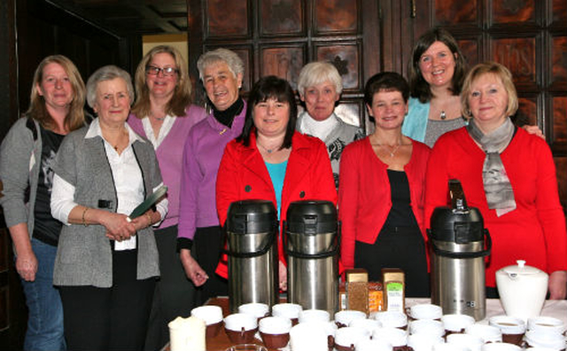 Mothers’ Union members prepare to serve tea at the inaugural Mums in May tea party in the Chapter Room of Christ Church Cathedral. 