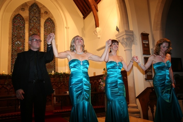 The three Sopranos Wendy Dwyer, Kay Lynch and Deirdre Masterson with their Pianist David Rea taking a bow at the conclusion of their concert in Christ Church, Delgany in aid of Delgany National School.