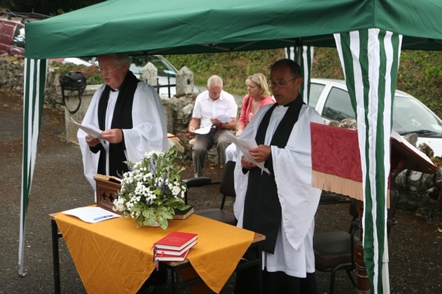 The Revd Canon Tom Haskins (left) and the Revd Canon George Butler leading the singing at the Ballinatone Pets Blessing Service.