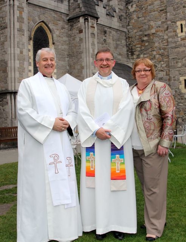 Archbishop Michael Jackson, the Revd Eugene Griffin and his wife, Joanna following Eugene’s ordination to the priesthood in Christ Church Cathedral. 