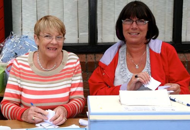 Marie Morrison and Anne Harris running the raffle at Wicklow Parish Fete.