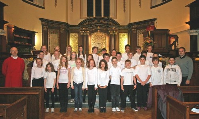 Pupils from Kildare Place School with their principal and organist at Songs of Praise in St Ann’s Church, Dawson Street, Dublin