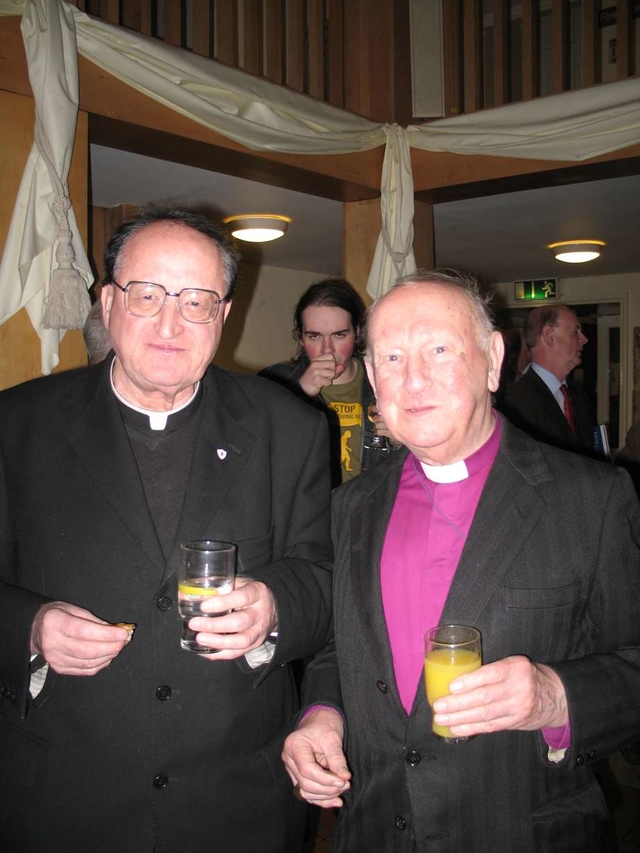 Pictured at the launch of From the Margins to the Centre – A History of the Irish Times in Trinity College Dublin are Fr Anthony Gaughan, (RC) Parish Priest of Newtown Park Blackrock and the former Archbishop of Dublin, the Rt Revd Donald Caird.