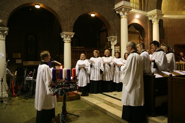 The Choir, comprising theological institute students with choral students resident at the institute singing at the CITI Advent Carol Service in St Georges and St Thomas.