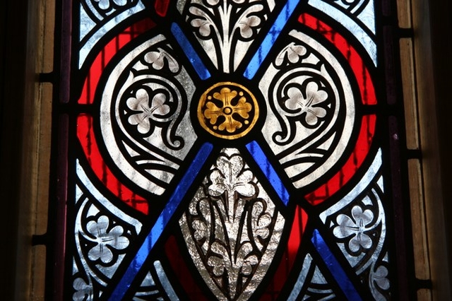 A close up photo of the stained glass window in St Laurence's Church, Chapelizod, one of two re-dedicated by the Archbishop of Dublin, the Most Revd Dr John Neill following their extensive refurbishment.