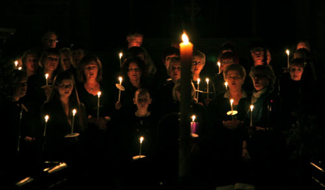 Members of the Unity Gospel Choir performed by candlelight at the Easter Vigil at Killiskey Parish Church, Nun’s Cross, County Wicklow. 