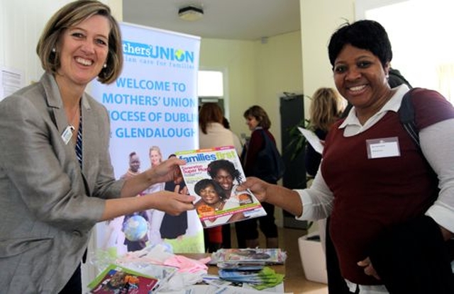 Jenny O’Regan of the Mothers’ Union gives information to Doris Ogodo at the Diocesan Faith in Action Conference at the Church of Ireland College of Education. 
