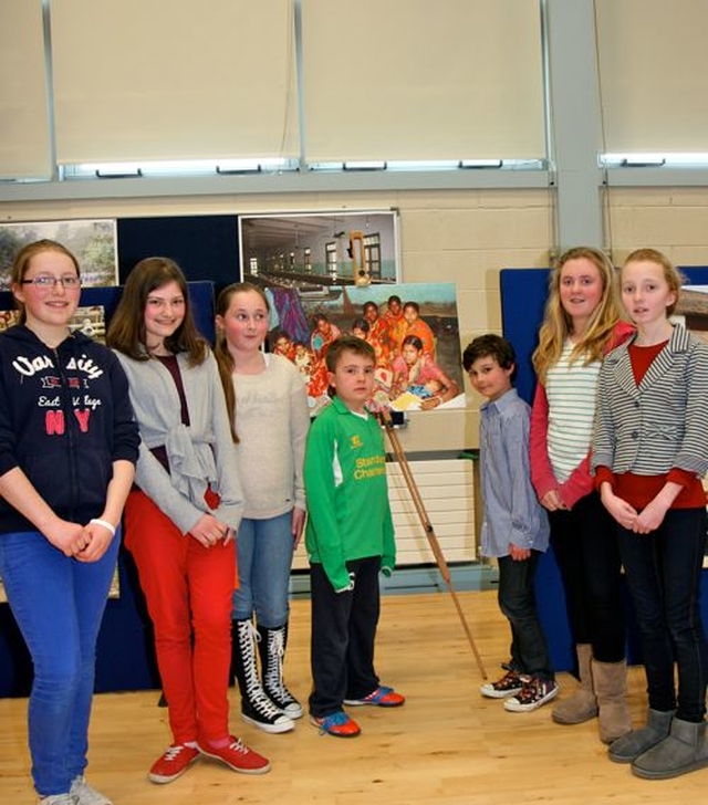 Children of Blessington No 1 School admire the photographs from Calcutta taken Dr Dave Mulcahy. The exhibition was mounted in their school to celebrate the dedication of Khanaberia Primary School in Calcutta which was refurbished through their fundraising efforts. 