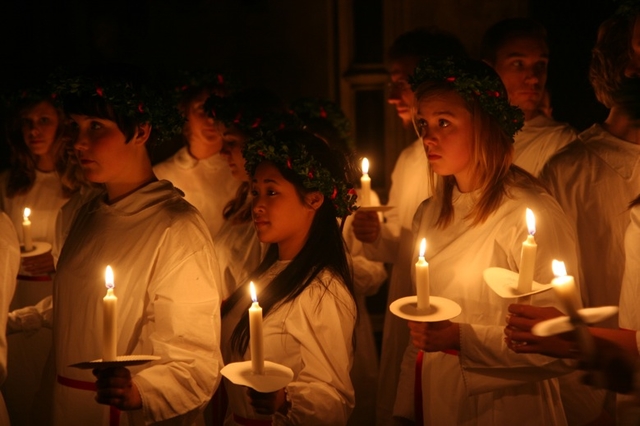 Members of Adolf Fredrik's Youth Choir , Stockholm about to process at the Sankta Lucia celebration in Christ Church Cathedral.