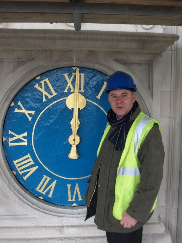 Pictured is Diocesan Secretary Scott Hayes by the clockface of St Stephen's Church (AKA 'the Peppercanister') during its recent refurbishment.