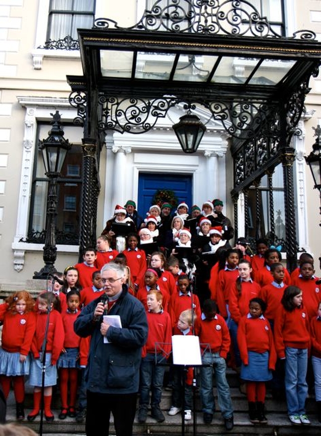 The Revd Ken Rue of the Diocesan Council for Mission introducing the Community Carol Singing which took place on the steps of the Mansion House in Dublin on December 15. 