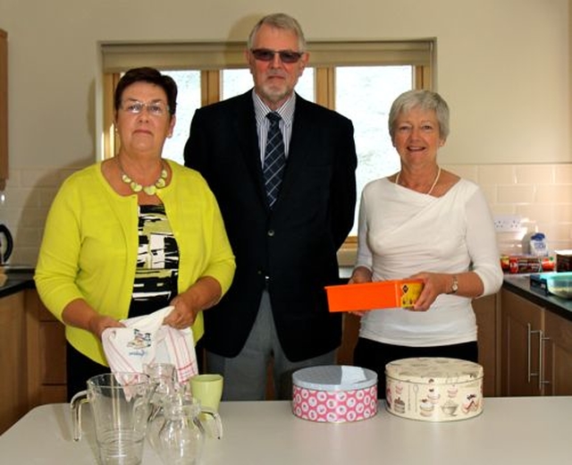 Ruth Connolly and Tony and Janet Sutton in the new kitchen of the reconstructed and extended Stables building in Whitechurch Parish. 