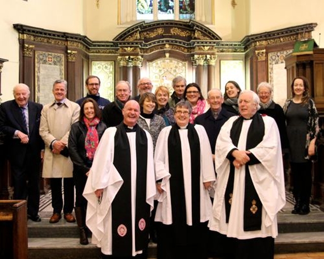 Representatives of the charities who benefited from the Black Santa Sit out at St Ann’s, Dawson Street, are pictured with the Vicar, Canon David Gillespie, the Revd Yvonne Ginnelly and Dean Houston McKelvey. 
