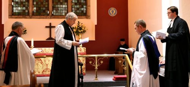 Canon Mark Gardner is commissioned as incumbent of the new union of St Catherine and St James with St Audoen by Archbishop Michael Jackson. Also pictured are Archdeacon David Pierpoint and Revd Stephen Farrell. 