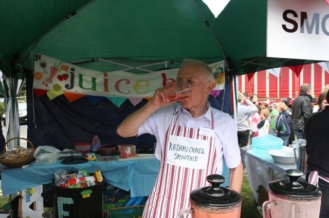 Trying out the merchandise at the 'Rathmichael Smoothies' stand at the Rathmichael Parish Fete.