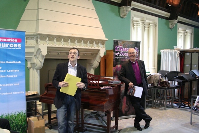 Pictured is Andrew Brannigan (left) speaking at the launch of his book, An Introduction to the Church of Ireland. Also pictured is the Archbishop of Armagh, the Most Revd Alan Harper who spoke at the launch. The launch took place in the context of General Synod, presently taking place in Christ Church Cathedral, Dublin.