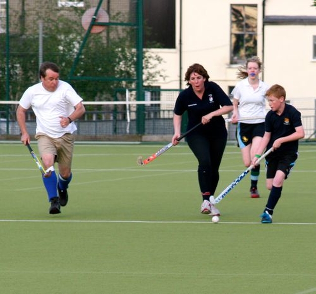 Players from Bray hunt down the ball in their match against Newcastle in the annual Diocesan Inter–Parish Hockey Tournament at St Andrew’s College. 