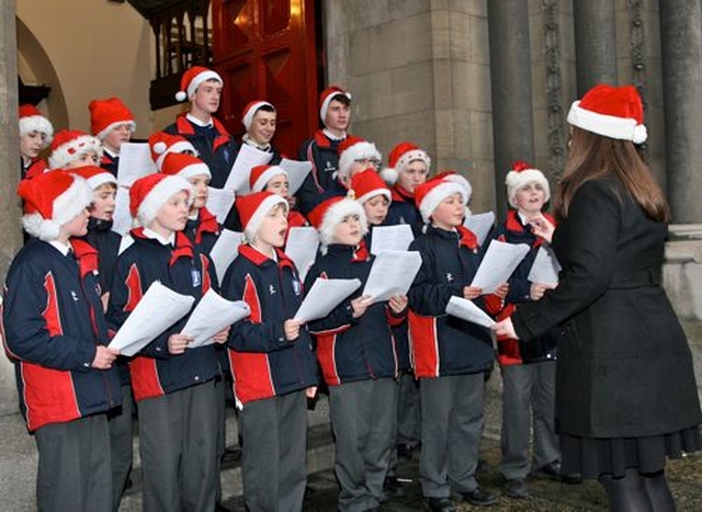 The choir of the Catholic University Choir sang carols and festive songs at St Ann’s Church on Dawson Street as part of the Black Santa Sit Out on Thursday December 20. 