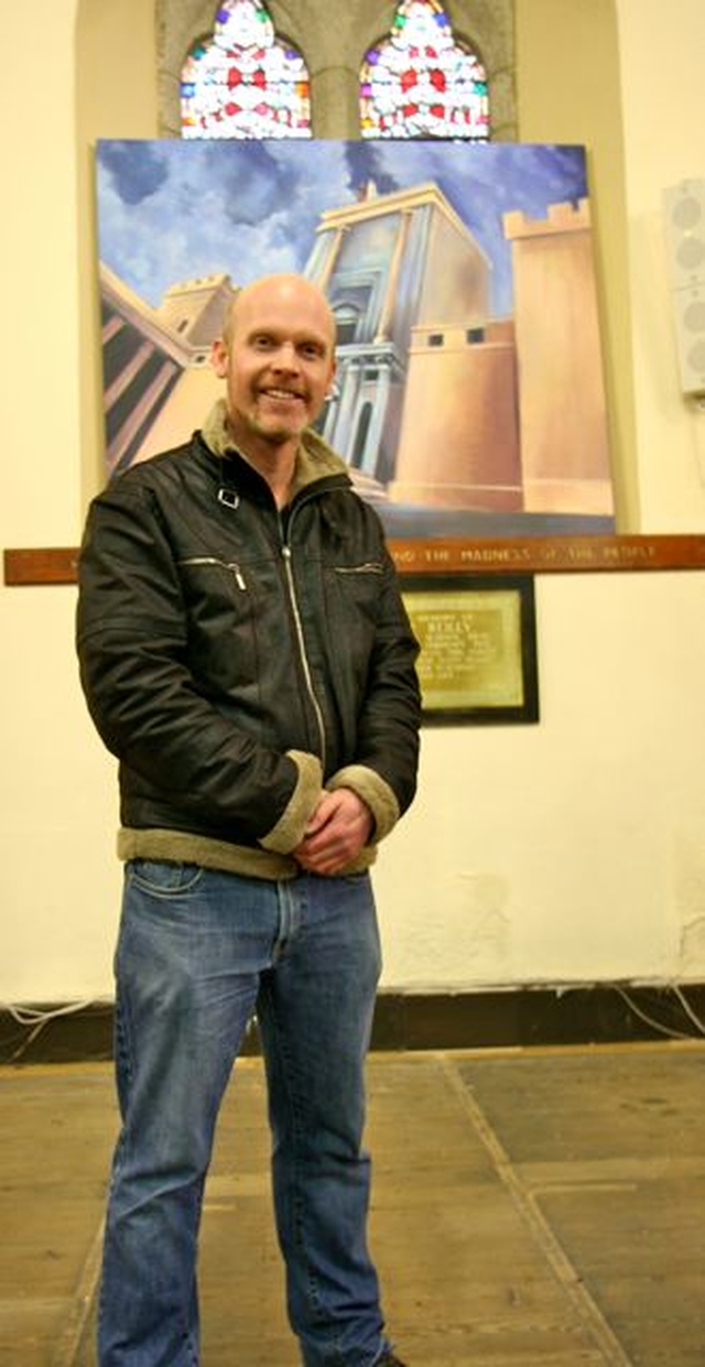 Artist Darren Nesbitt in front of one of his paintings which are on display as part of the Narnia Festival in Christ Church Bray. The festival runs until Easter Sunday. 
