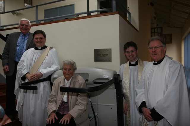 Pictured are the clergy of Taney at the dedication of a new chairlift donated by Dolly Turner (seated) in memory of her late husband Tom. (left to right) Dudley Dolan, Hon Secretary of the Select Vestry, the Revd Stephen Farrell, Curate, Dolly Turner, the Revd Niall Sloane, Curate and the Revd Canon Desmond Sinnamon, Rector of Taney.