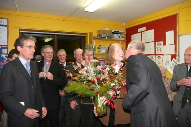 Patricia Butler, Chair of the Killiskey Stained Glass Committee receives a bouquet of flowers and a kiss from her Rector, the Revd Canon John Clarke in appreciation for her work in refurbishing the stained glass in Nuns Cross Church, Killiskey, near Ashford, Co Wicklow. The newly refurbished stained glass was re-dedicated by the Archbishop of Dublin and Bishop of Glendalough, the Most Revd Dr John Neill at a special service of Evening Prayer in the Church.