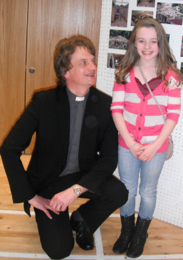 Rev Gary Dowd with a seven year old St Paul’s parishioner who gave all her pocket money to Kisiizi project which raised €200,000 for the construction of a new theatre building at the Ugandan Hospital and the training of an additional surgeon.