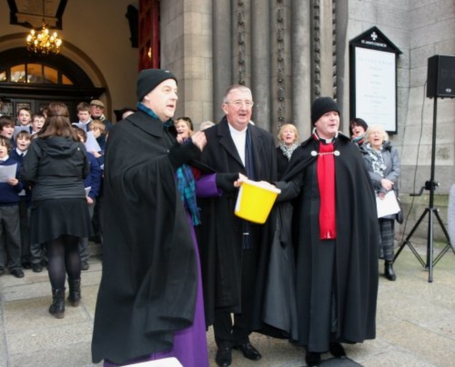 Archbishop Diarmuid Martin, Archbishop Michael Jackson and Vicar of St Ann’s Revd David Gillespie shake a bucket for the Black Santa Appeal which took place from Friday December 16 until Christmas Eve outside St Ann’s Church on Dawson Street. 