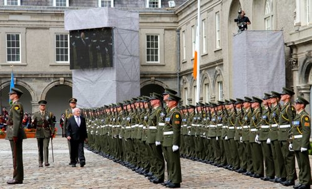 President Michael D Higgins inspects the Guard of Honour during the ceremony to mark the National Day of Commemoration which took place in the Royal Hospital Kilmainham today, July 14. 