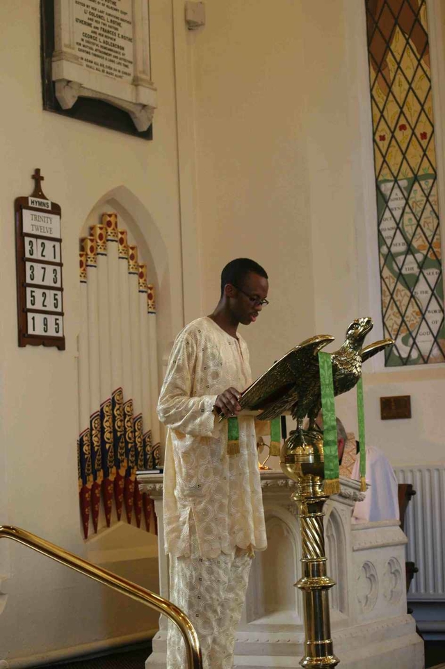 Ife Ademowo, son of the Archbishop of Lagos, the Most Revd Adebola Ademowo reads the lesson in Whitechurch at the baptism of his son, John.