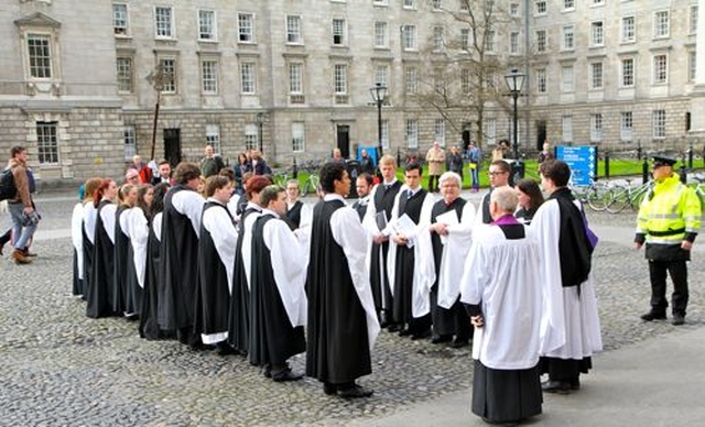 Members of Trinity College Chapel Choir in front of Trinity College Chapel following the Service of Commemoration and Thanksgiving marking Trinity Monday at the university this morning (April 7). 