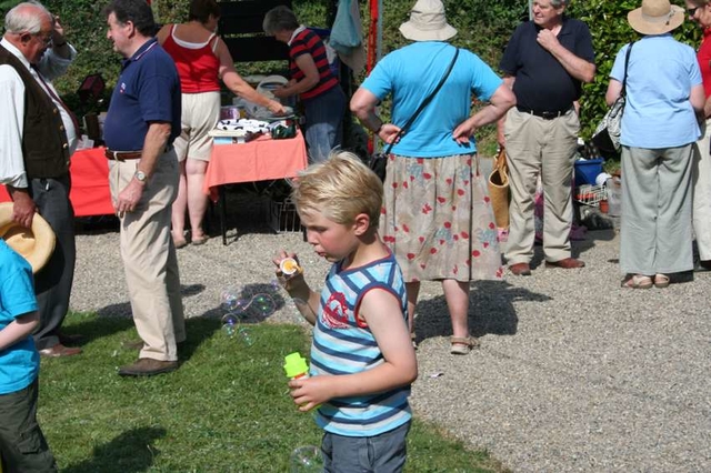 Young parishioner blowing bubbles at a parish fete in Co Wicklow.