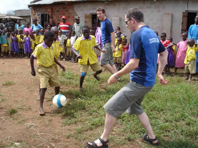 Graham Kinch from Dun Laoghaire and Ian Taylor of Leixlip, both congregants in CORE playing football with children from Kitandwe, Uganda. The two are hoping to raise over €80,000 through scaling four of the world’s most demanding peaks to help the construction of a school in Kitandwe through the Fields of Life project.