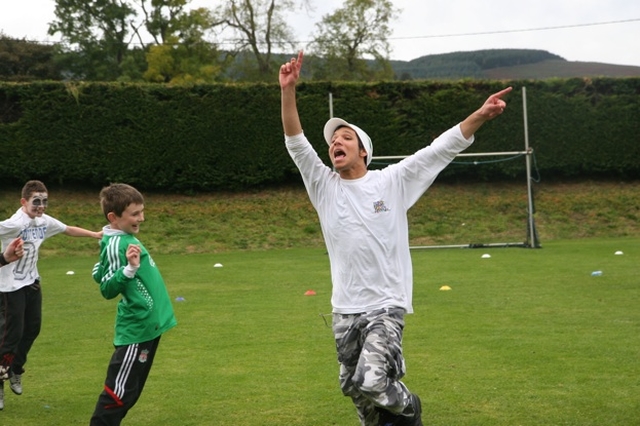 A home run during a rounders game at the Enniskerry Family Fun day, held in the local GAA club gounds. the day is part of the ecumenical Enniskerry youth festival.
