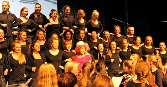 The sixth year choir of Alexandra College performs at the official opening of the new Henrietta White building on November 6. The building will have a wide range of uses from theatrical productions to sports and will be accessed by the wider community. 