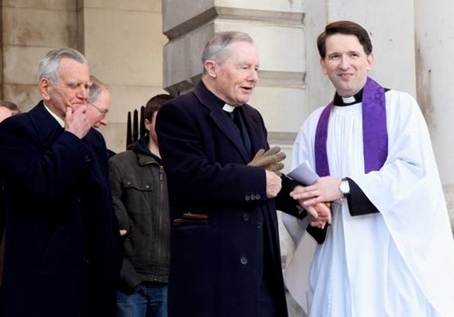 Former Dean of St Patrick’s Cathedral, the Very Revd Robert McCarthy with the Revd Darren McCallig as he said farewell to the TCD Chapel community. 