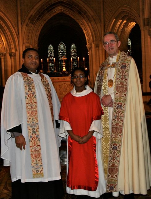 The Dean of Christ Church Cathedral, the Very Revd Dermot Dunne with the Revd Obinna Ulogwara and his daughter, who is a member of the new cathedral Girls’ Choir which was commissioned on Sunday January 20. 