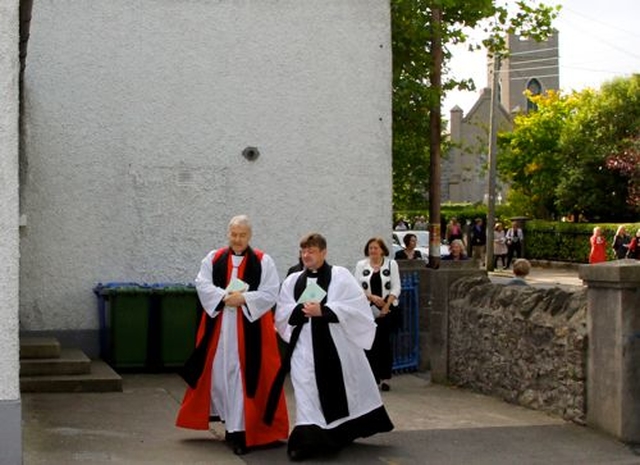 Archbishop Michael Jackson and the Revd Dr Norman Gamble make their way across to the school from St Andrew’s Church in Malahide to St Andrew’s National School were the new extension was officially opened this morning, October 11. 