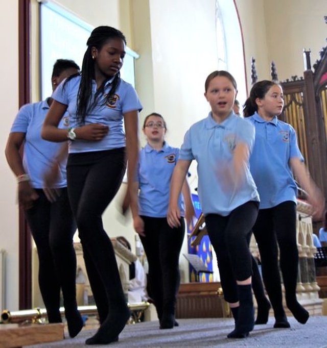 Pupils of Athy Model School take part in a Friendship Dance as part of the West Glendalough Children’s Choral Festival in St Michael’s Church, Athy. 