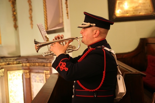 Bandsman Mark O'Connor of the Army No 1 Band plays the Last Post at the Service of Commemoration and Thanksgiving to mark ANZAC day in St Ann's Dawson Street.